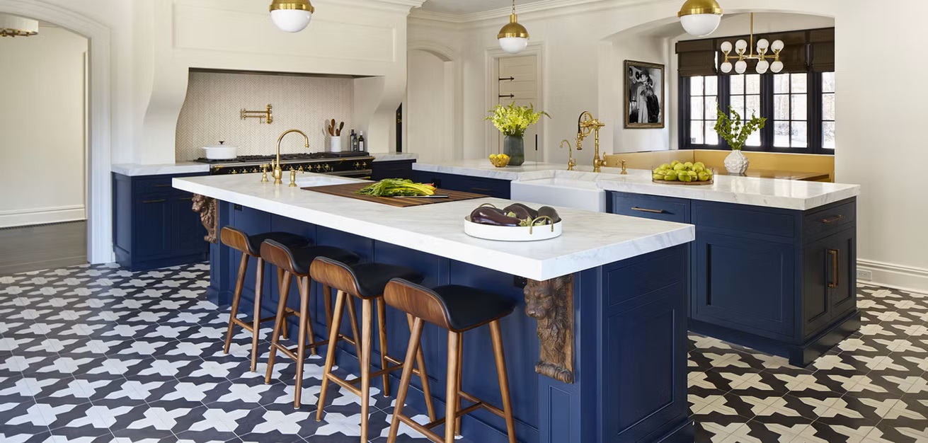 Custom kitchen with blue island cabinets and wonderful range hood